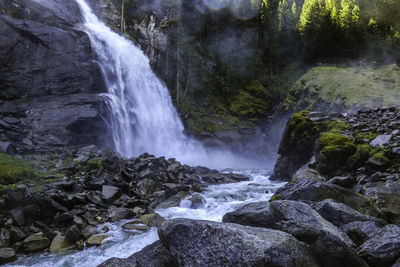 Scenic view of waterfall in forest