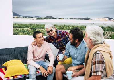 Group of people sitting at restaurant