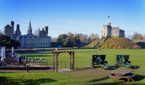 Gazebo in park against buildings in cardiff castle