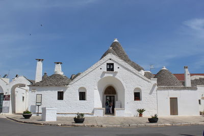 Facade of building against sky