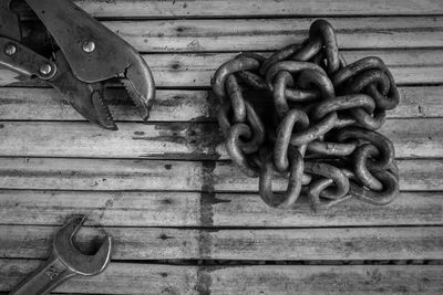 High angle view of rusty metal on table