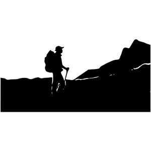 Low angle view of silhouette man walking against clear sky