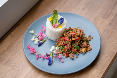 High angle view of salad in plate on table