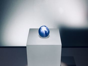 Close-up of illuminated lamp on wall