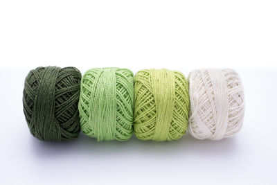 Close-up of green over white background