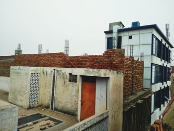 Residential buildings against clear sky