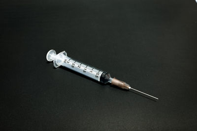 High angle view of sign on table