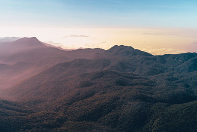 Scenic view of mountains against sky during sunset