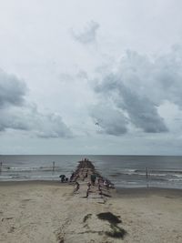 Scenic view of beach against sky