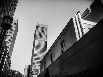 Low angle view of buildings against clear sky