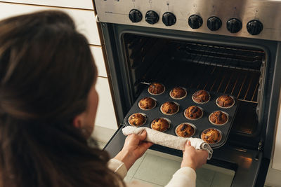 High angle view of woman preparing food at home