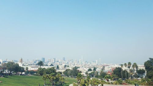 Panoramic view of city against clear sky