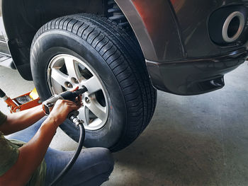 Mechanic changing car wheel