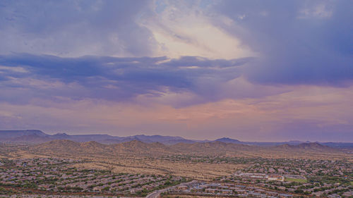 Scenic view of landscape against sky during sunset
