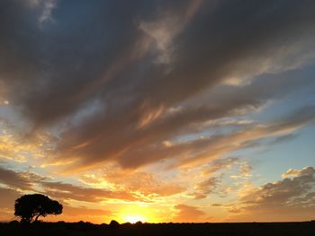 Low angle view of dramatic sky during sunset