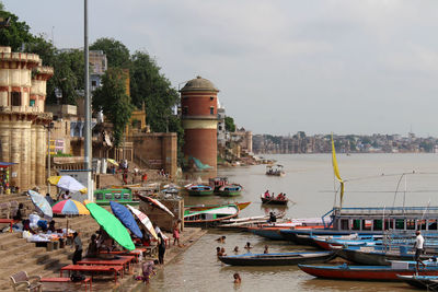 Boats moored at harbor