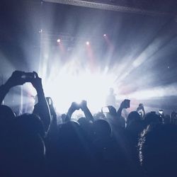 People enjoying at music concert