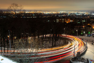 High angle view of light trails on road at night