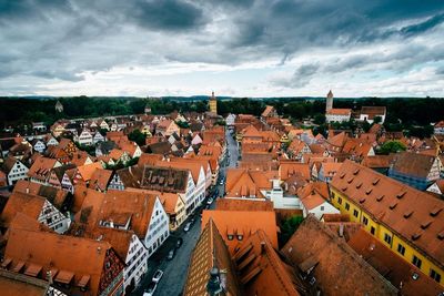 High angle view of townscape against cloudy sky