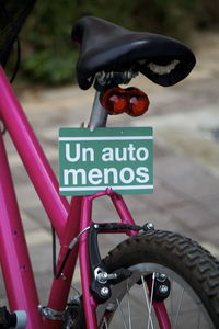 Close-up of bicycle sign
