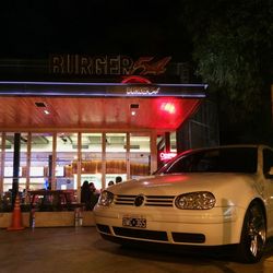 Cars on road in city at night