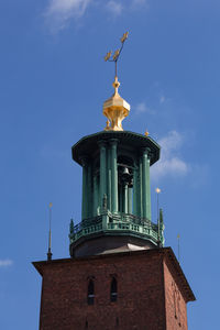 Low angle view of kungsholmen town hall against sky