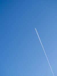 Low angle view of vapor trail in sky