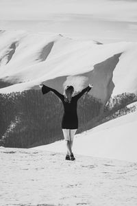 Slim lady in dress on ridge monochrome scenic photography