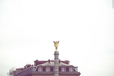 Low angle view of statue of liberty against clear sky