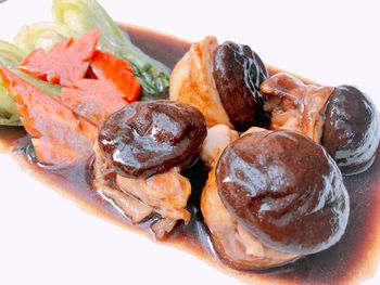 Close-up of food against white background