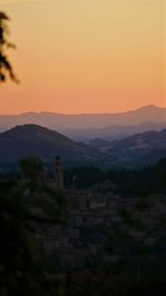 Scenic view of mountains against sky during sunset