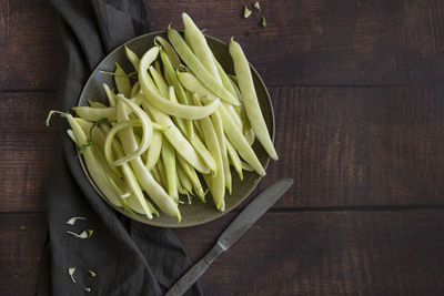 High angle view of chopped vegetables in bowl on table