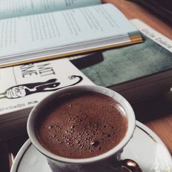 Close-up of coffee cup on table