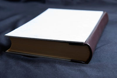 Close-up of open book on table