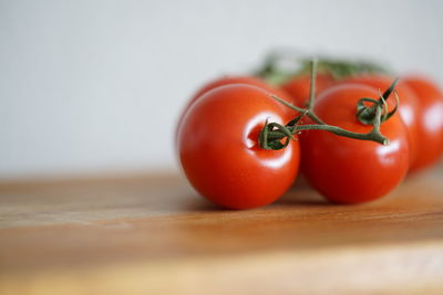 Close-up of tomatoes on cutting board