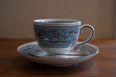 Close-up of coffee cup on table