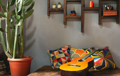 Rustic sofa with acoustic guitar and relaxed and classic decoration