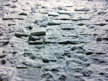 Close-up of tire tracks on snow