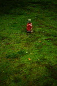 Full length of boy on field