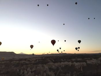 View of hot air balloons flying in sky