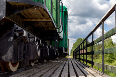 Train on railroad track against sky