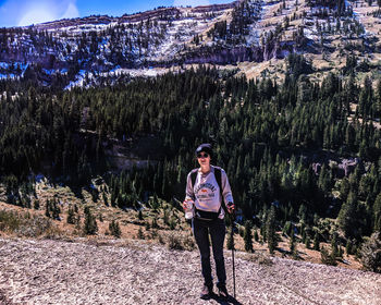 Portrait of man standing on mountain