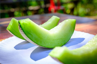 Close-up of fruit in plate on table