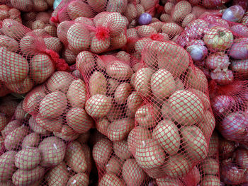 Full frame shot of onions for sale in market