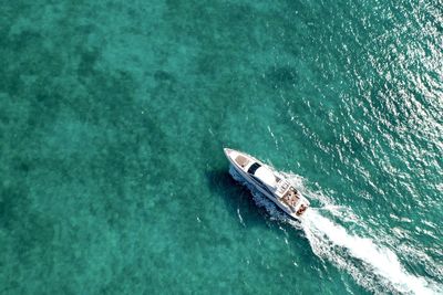 High angle view of ship sailing in sea