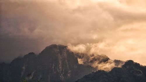 Scenic view of mountains against sky during sunset