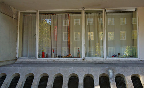 Reflection of building on glass window