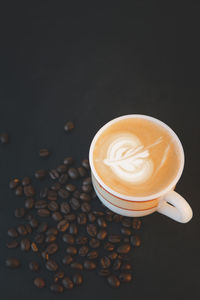 Close-up of coffee cup on table