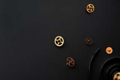 Close-up of buttons on black background