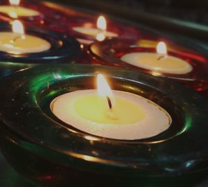 Close-up of lit tea light candles